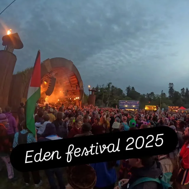 An evening festival crowd in front of the main stage at Eden Festival 2025.